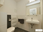Bestlage Kaiserebersdorf! Möblierte 2-Zimmer-Wohnung für Singles oder Pärchen mit Balkon, Gartennutzung und Schwimmbiotop - Bild