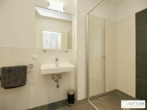 Bestlage Kaiserebersdorf! Möblierte 2-Zimmer-Wohnung für Singles oder Pärchen mit Balkon, Gartennutzung und Schwimmbiotop - Bild