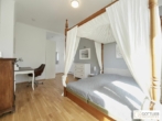 Bestlage Kaiserebersdorf! Möblierte 2-Zimmer-Wohnung für Singles oder Pärchen mit Balkon, Gartennutzung und Schwimmbiotop - Bild