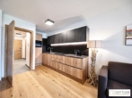 Bestlage Pinzgau mit ca. 6% Rendite! 3-Zimmer-Maisonette mit Terrasse, Balkon sowie beheiztem Aussenpool - Bild
