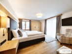 Bestlage Pinzgau mit ca. 6% Rendite! Sonniges 4-Zimmer-Apartment mit zwei Terrassen sowie Aussenpool - Bild
