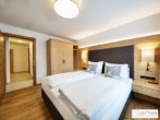Bestlage Pinzgau mit ca. 6% Rendite! Sonniges 4-Zimmer-Apartment mit zwei Terrassen sowie Aussenpool - Bild