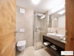 Bestlage Pinzgau mit ca. 6% Rendite! Sonniges 4-Zimmer-Apartment mit zwei Terrassen sowie Aussenpool - Bild