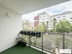 Titelbild - Nähe Schloss Neugebäude! Bis November 2026 befristet vermietete sonnige 2-Zimmer-Wohnung mit Loggia und Tiefgaragenplatz in Grünruhelage