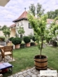 Bestlage Grinzing! Außergewöhnliche 3-Zimmer-Wohnung mit südseitigem Eigengarten in historischem Winzerhaus aus dem 16. Jahrhundert - Bild
