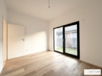 Bild - Erstbezug in Grünruhelage! Sonnendurchfluteter Bungalow mit Terrasse, großzügigem Garten und zwei Stellplätzen