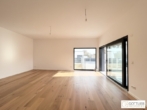 Bild - Erstbezug in Grünruhelage! Sonnendurchfluteter Bungalow mit Terrasse, großzügigem Garten und zwei Stellplätzen