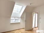 Grünruhelage nahe Belvedere! Luxuriöse 3-Zimmer-Erstbezug-Dachgeschoss-Wohnung mit zwei Balkonen in historischem Gebäude - Bild