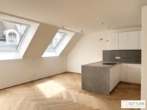Grünruhelage nahe Belvedere! Luxuriöse 3-Zimmer-Erstbezug-Dachgeschoss-Wohnung mit zwei Balkonen in historischem Gebäude - Bild