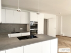 Grünruhelage nahe Belvedere! Luxuriöse 3-Zimmer-Erstbezug-Dachgeschoss-Wohnung mit zwei Balkonen in historischem Gebäude - Bild