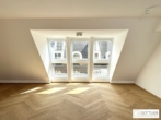 Grünruhelage nahe Belvedere! Luxuriöse 3-Zimmer-Erstbezug-Dachgeschoss-Wohnung mit zwei Balkonen in historischem Gebäude - Bild