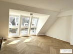 Grünruhelage nahe Belvedere! Luxuriöse 3-Zimmer-Erstbezug-Dachgeschoss-Wohnung mit zwei Balkonen in historischem Gebäude - Bild