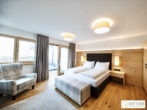 Bestlage Pinzgau mit ca. 6% Rendite! 3-Zimmer-Wohnung mit Südterrasse sowie beheiztem Aussenpool - Bild