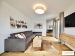 Bestlage Pinzgau mit ca. 6% Rendite! 3-Zimmer-Wohnung mit Südterrasse sowie beheiztem Aussenpool - Bild