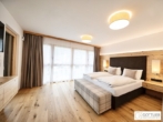 Bestlage Pinzgau mit ca. 5% Rendite! Sonniges 5-Zimmer-Penthouse mit Loggia sowie beheiztem Aussenpool - Bild