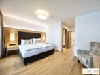 Bestlage Pinzgau mit ca. 6% Rendite! 3-Zimmer-Maisonette mit Balkonen sowie beheiztem Aussenpool - Bild